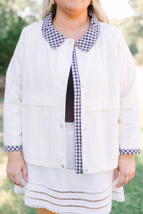 Plus Size cream cotton jacket with a gingham collar and cuffs over a matching white eyelet skirt.