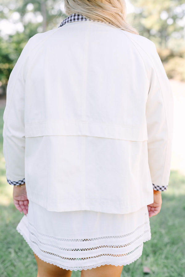 Plus Size cream cotton jacket with a gingham collar and cuffs over a matching white eyelet skirt.