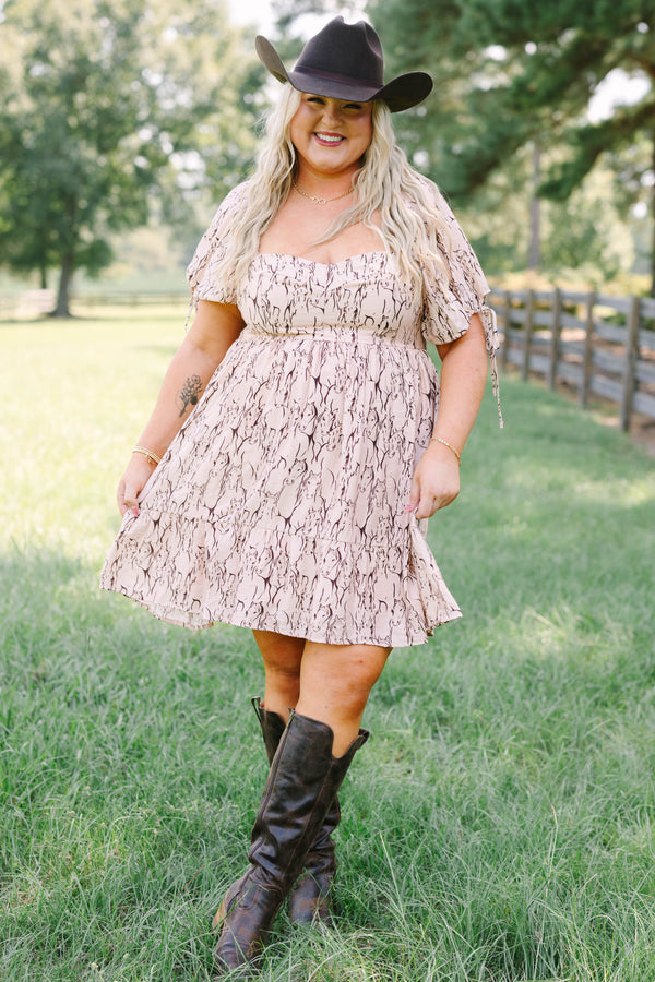 Plus Size mauve dress with a horse print, sweetheart neckline, and short puff sleeves.