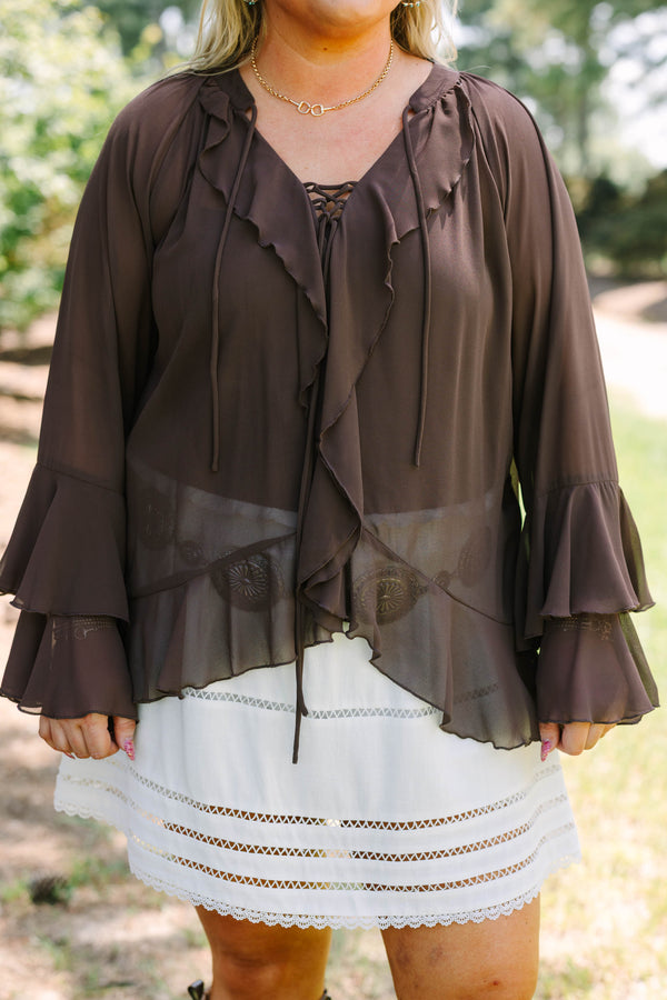 Plus Size brown long sleeve top with ruffle trim, lace-up neckline, and tiered bell sleeves.