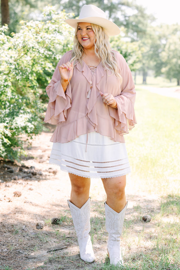 Plus Size dusty pink long sleeve top with ruffle details, a lace-up neckline, and tiered sleeves.