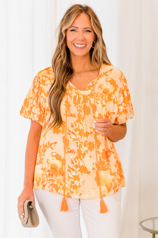 Chic Soul plus size clothing, short sleeve orange top with darker orange floral pattern and orange tassels