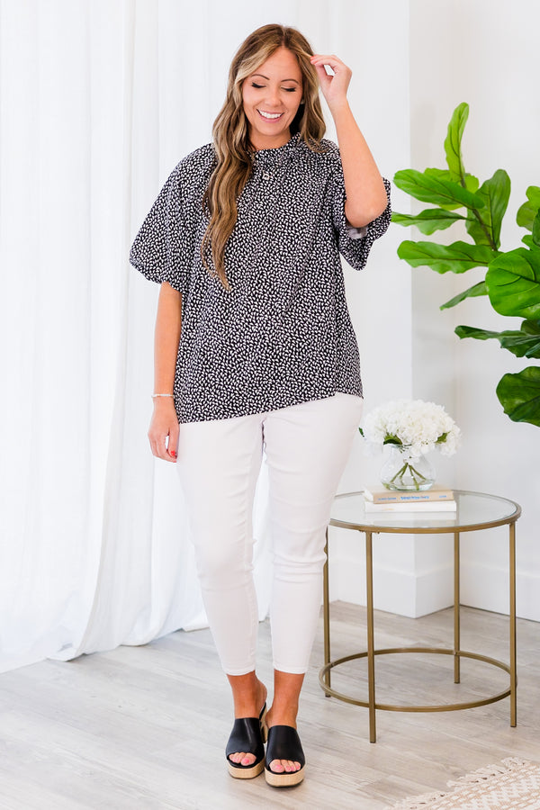 Chic Soul plus size clothing, black short sleeve top with white pattern with puff sleeves