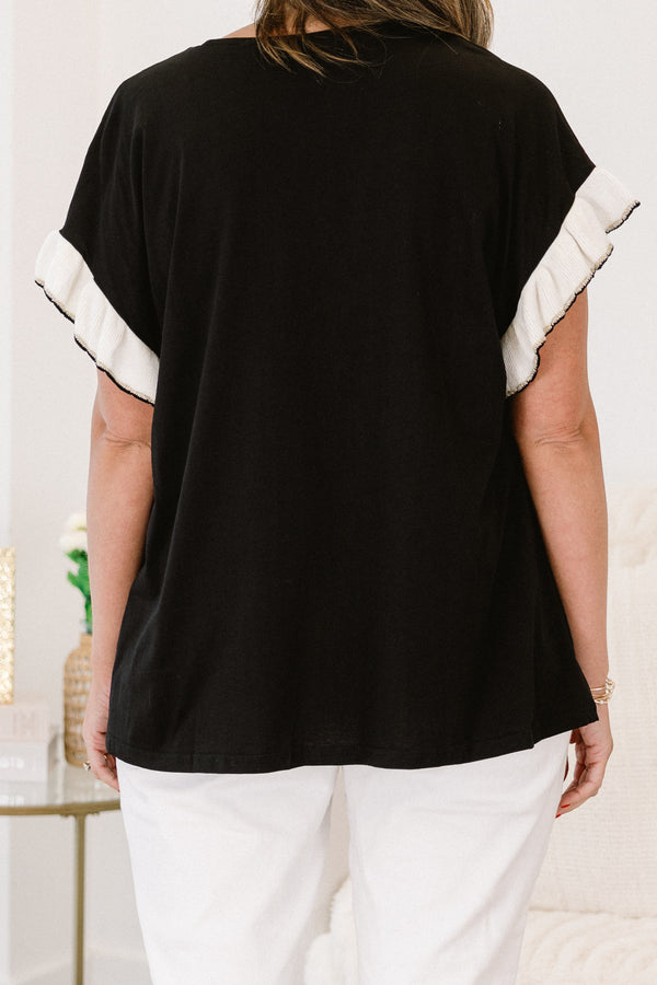 Chic Soul Plus size clothing, black casual top with white flutter sleeves and black stitching detail at the end of each sleeve 

