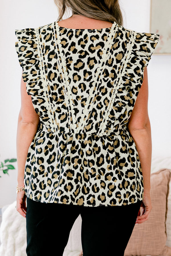 Chic Soul Plus size clothing, leopard peplum top with flutter sleeves and white scalloped detail on the v-neckline 
