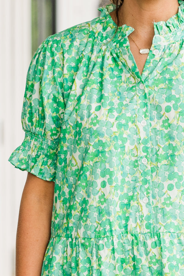 Chic Soul plus size clothing, puffed short sleeve green ruffled baby doll dress with smocked v-neckline and floral green and yellow pattern 