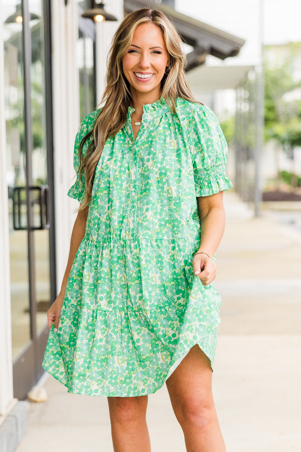 Chic Soul plus size clothing, puffed short sleeve green ruffled baby doll dress with smocked v-neckline and floral green and yellow pattern 