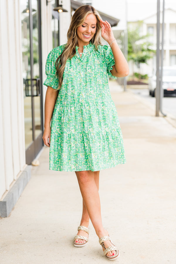 Chic Soul plus size clothing, puffed short sleeve green ruffled baby doll dress with smocked v-neckline and floral green and yellow pattern 