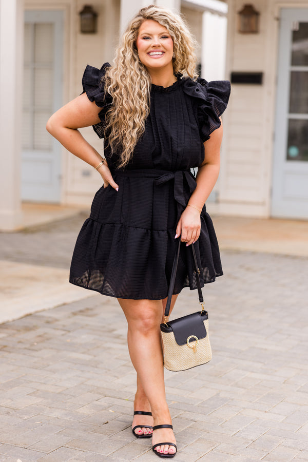 Chic Soul plus size clothing, black dress with ruffles, pleated neckline, and waist tie