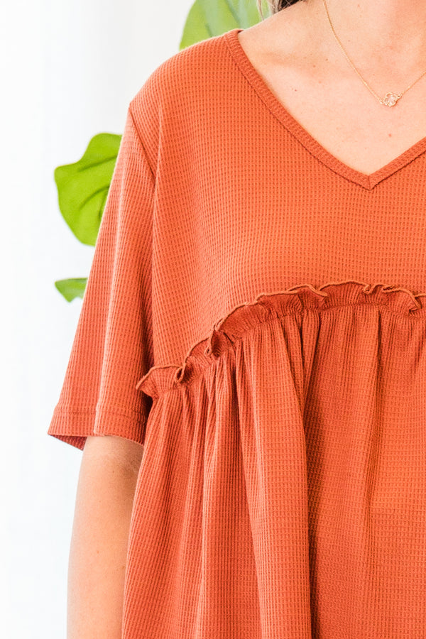 Chic Soul plus size clothing, short-sleeve copper orange baby doll top with ruffled detailing and v-neckline