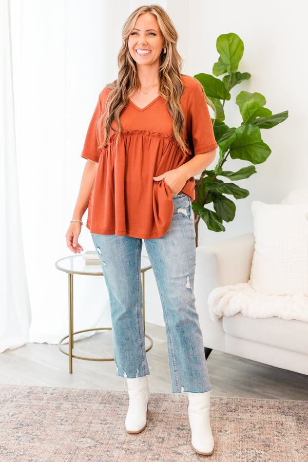 Chic Soul plus size clothing, short-sleeve copper orange baby doll top with ruffled detailing and v-neckline
