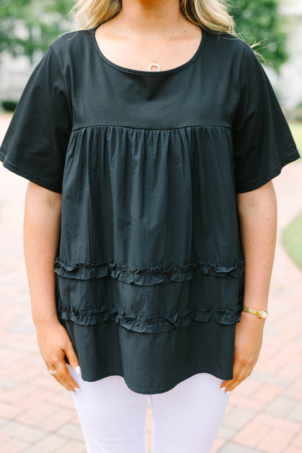Chic Soul plus size clothing, black short sleeve flowy top with round neckline with cinch along chest with ruffle stripe detail along bottom