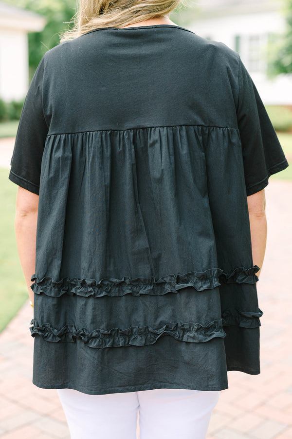 Chic Soul plus size clothing, black short sleeve flowy top with round neckline with cinch along chest with ruffle stripe detail along bottom