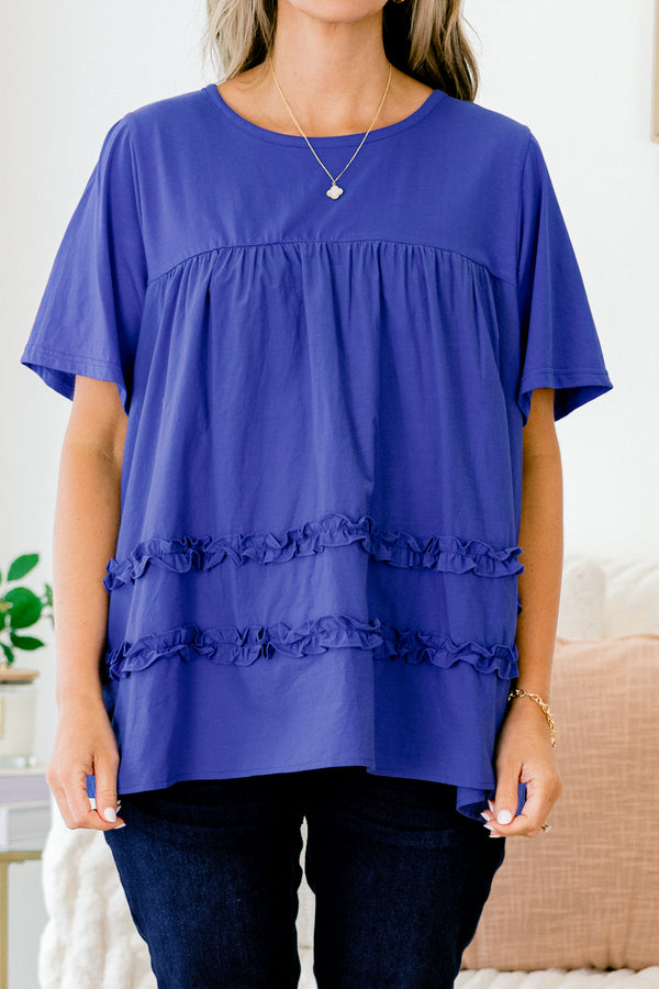 Chic Soul Plus size clothing, blue short sleeve blouse with ruffle detailing the bottom of the shirt 
