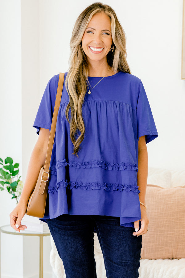 Chic Soul Plus size clothing, blue short sleeve blouse with ruffle detailing the bottom of the shirt 
