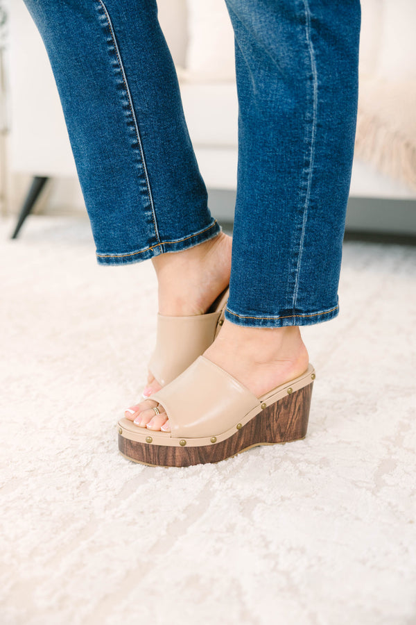 Plus Size brown faux leather wedge sandals with a wood-grain platform and stud details.