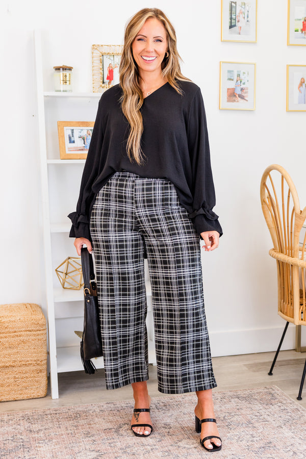 Chic Soul plus size clothing, long-sleeve black top with ruffled smocked sleeves and v-neckline