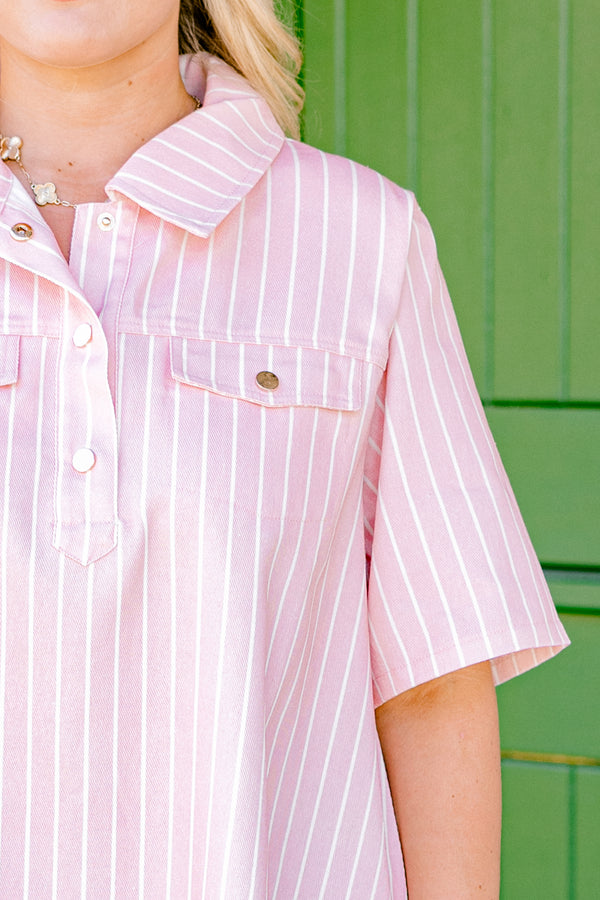 Chic Soul plus size clothing, pink dress with white stripes going down the dress two front pockets and a button up neckline 