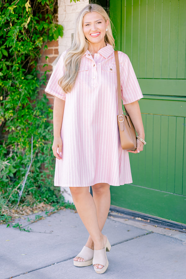 Chic Soul plus size clothing, pink dress with white stripes going down the dress two front pockets and a button up neckline 