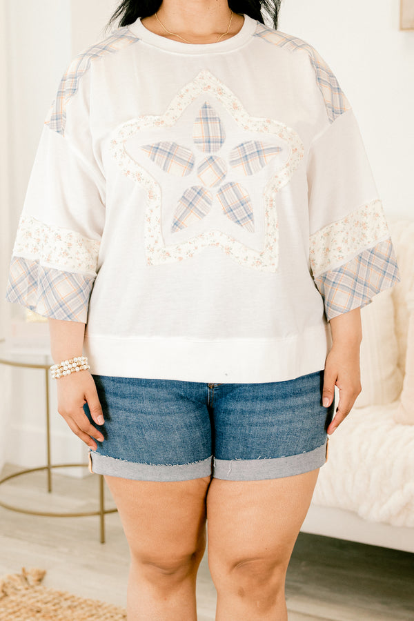 Plus Size white boho top with patchwork star design, plaid accents, and drop shoulder sleeves.