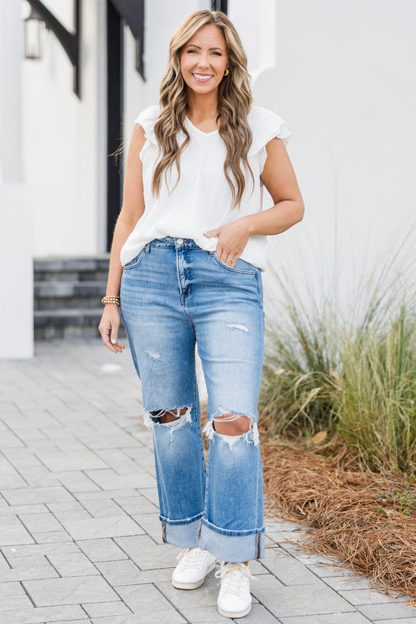 Chic Soul plus size clothing, mid-waisted medium wash cropped straight leg distressed jeans with silver button detailing