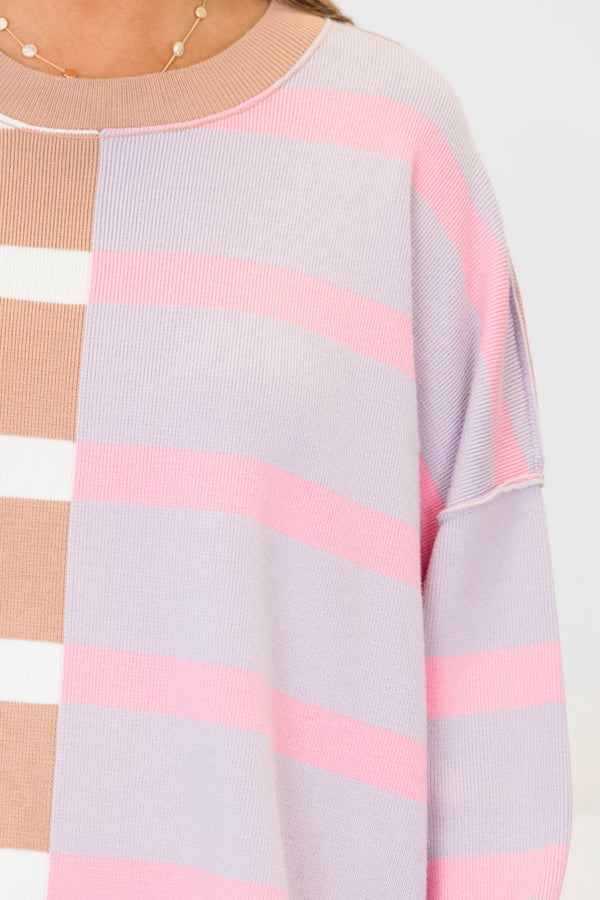 Chic Soul plus size clothing, two toned long sleeve knit sweater with cuff sleeves and round neckline with brown and white stripes on one side with pink and grey striped on the other 