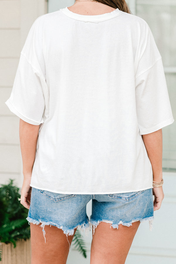 Chic Soul plus size clothing, short-sleeve vintage white wash tee with a high-scoop-neckline and a drop-shoulder with a red and blue graphic of two cowboy boots