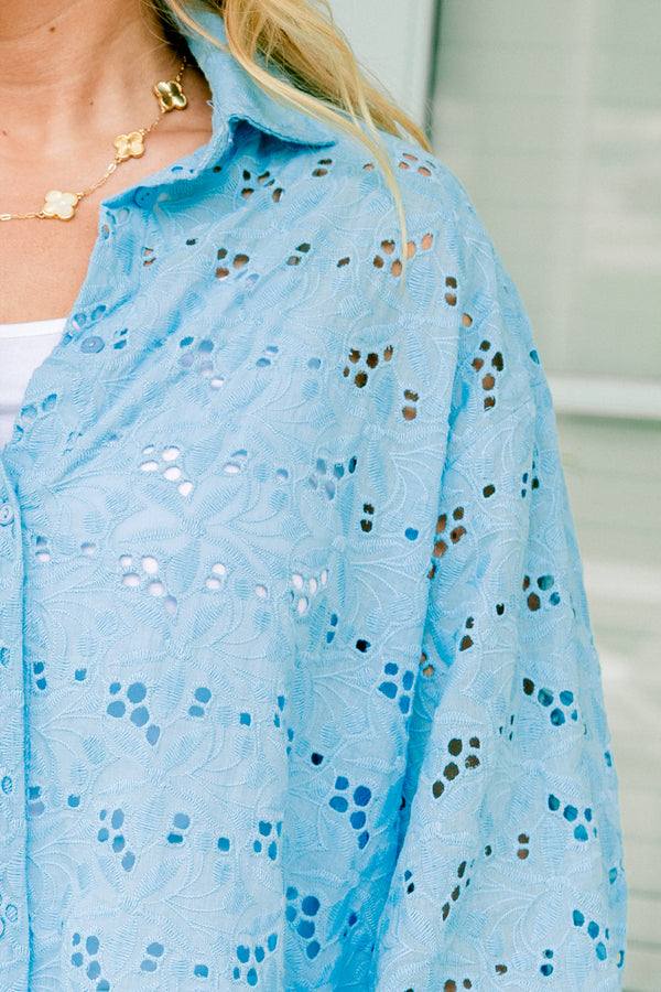 Chic Soul plus size clothing, light blue eyelet button-up top with long sleeves, a collar, and a relaxed fit with floral cutout patterns throughout