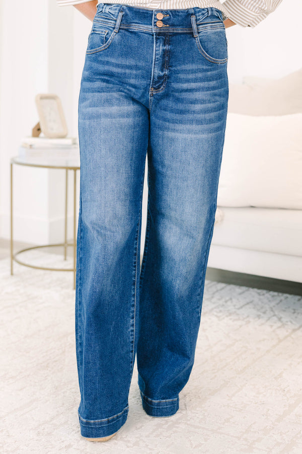 Plus Size wide-leg dark wash jeans with a double-button waistband and subtle fading.
