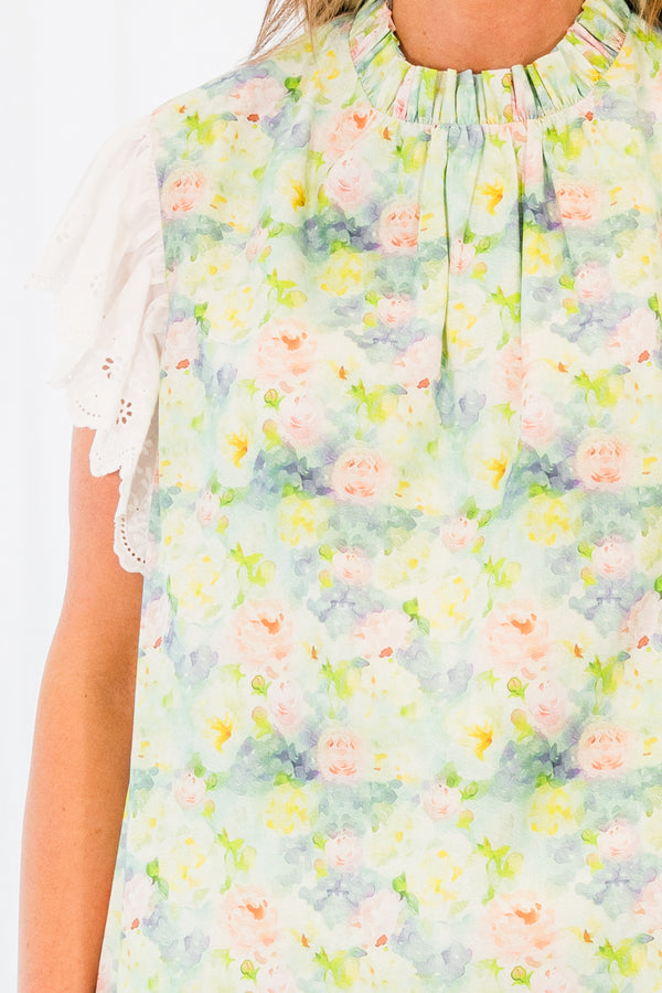 Chic Soul plus size clothing, white short-flutter-sleeve sage green top with a ruffled mock neck and a subtle watercolor floral pattern
