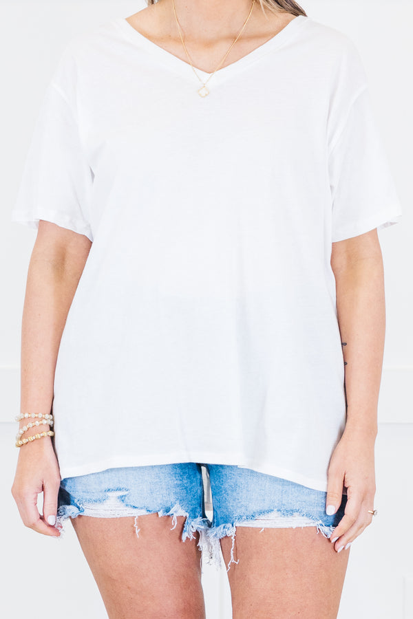Plus Size white v-neck short sleeve cotton tee with light wash distressed denim shorts.