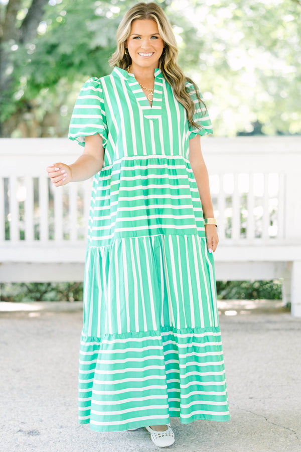 Plus size kelly green and white striped maxi dress with bubble sleeves and v-neckline.