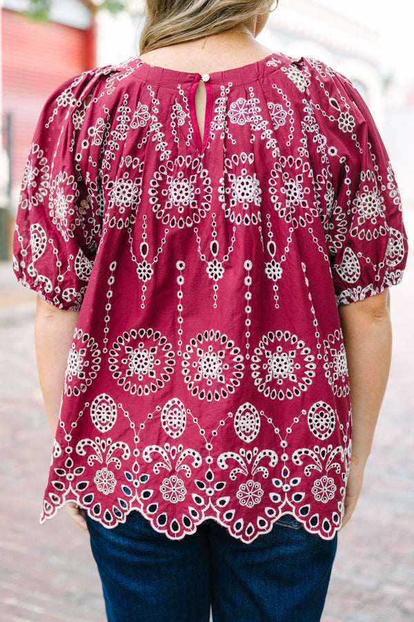 Plus Size burgundy eyelet top with elastic bubble sleeves and a scalloped hem.