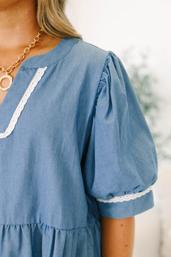 Chic Soul plus size clothing, denim blue short sleeve peplum top with puff sleeves and white detail on sleeves and v neckline 