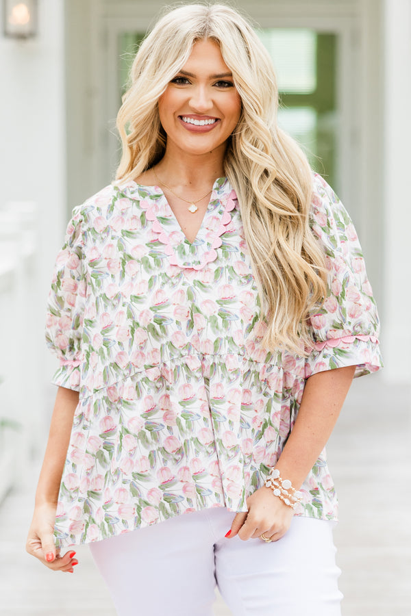Chic Soul plus size clothing, white elbow length short sleeve top with v cutout along round neckline with pink scalloped detail along neckline and detail along cuff sleeves with pink and green tulip print 