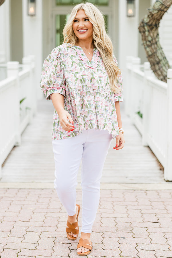 Chic Soul plus size clothing, white elbow length short sleeve top with v cutout along round neckline with pink scalloped detail along neckline and detail along cuff sleeves with pink and green tulip print 