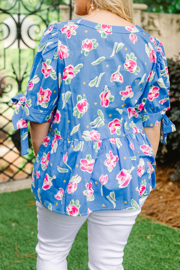 Chic Soul plus size clothing, blue short sleeve babydoll top with pink floral pattern, bow tie sleeves, and white scallop v-neck