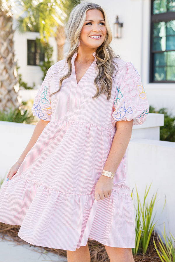 Chic Soul plus size clothing, pink striped tiered dress with bubble sleeves that have multicolored stitched hearts on them as well as a v-neckline 