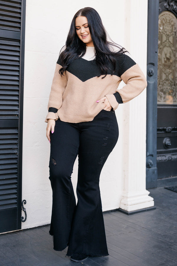 Chic Soul plus size clothing, black flare jeans with a distressed hemline