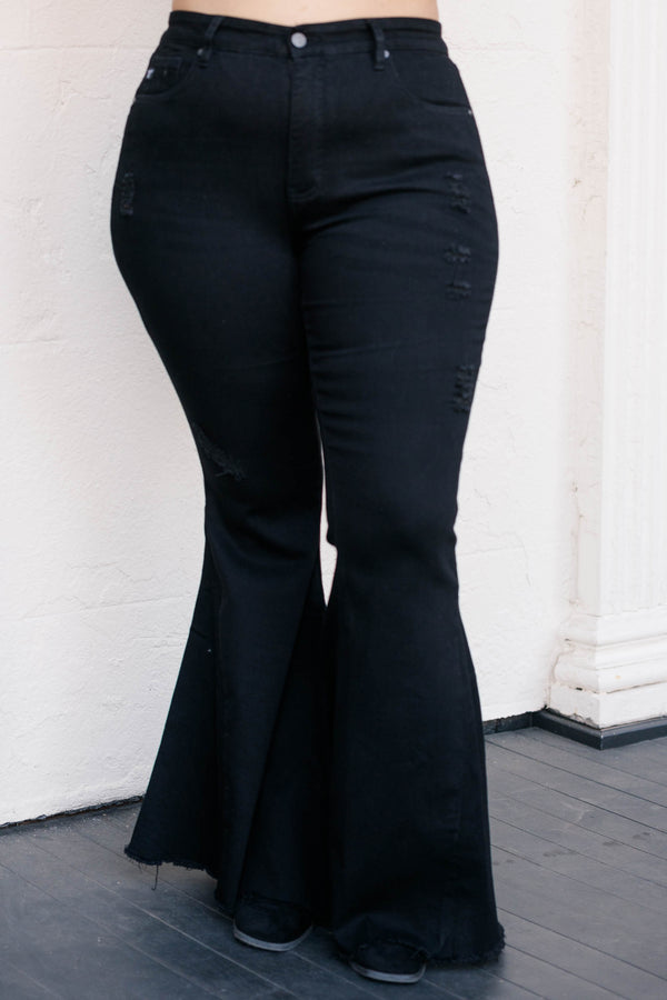 Chic Soul plus size clothing, black flare jeans with a distressed hemline