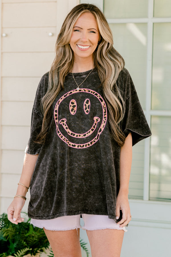 Chic Soul plus size clothing, ash black acid wash short sleeve boyfriend tee with round neckline and pink leopard print smiley graphic on the front
