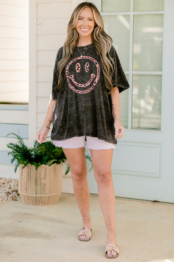 Chic Soul plus size clothing, ash black acid wash short sleeve boyfriend tee with round neckline and pink leopard print smiley graphic on the front
