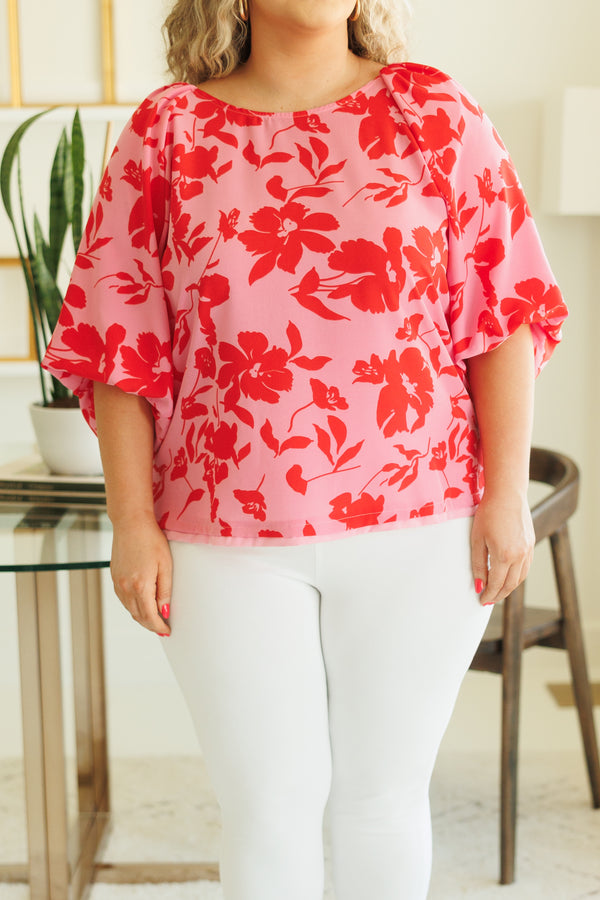 Chic Soul plus size clothing, pink flowy blouse with red floral pattern and bubble sleeves