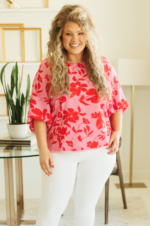 Chic Soul plus size clothing, pink flowy blouse with red floral pattern and bubble sleeves