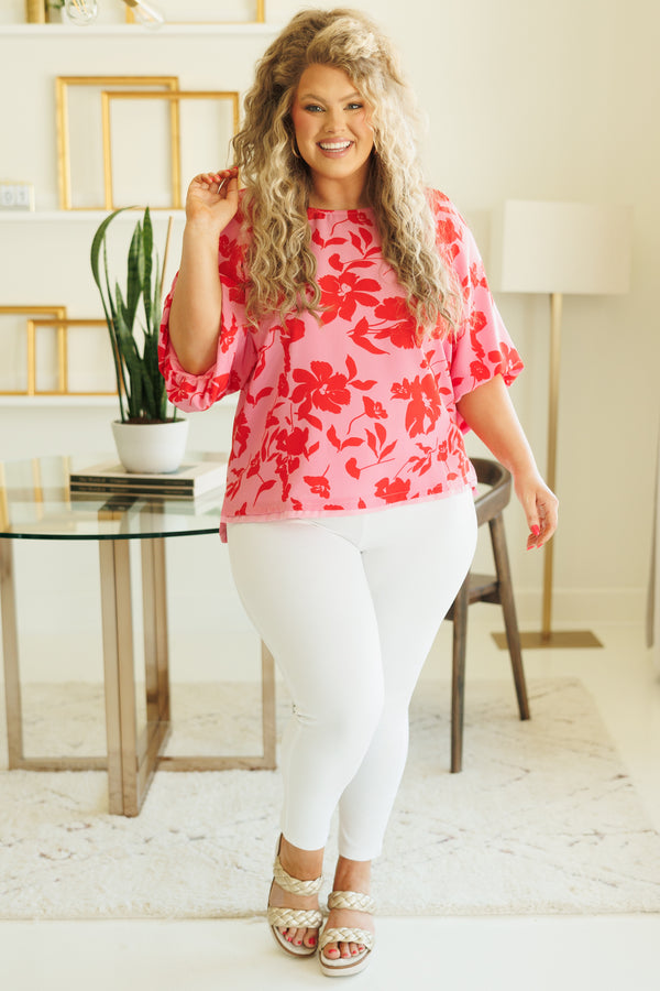 Chic Soul plus size clothing, pink flowy blouse with red floral pattern and bubble sleeves