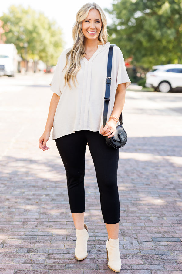 Plus Size black, stretchy cropped business pants with a wide waistband and slim fit.