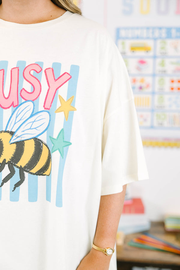 Plus size ivory oversized cotton boyfriend tee with a colorful busy bee graphic.