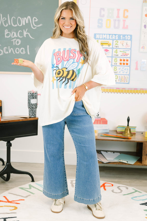 Plus size ivory oversized cotton boyfriend tee with a colorful busy bee graphic.