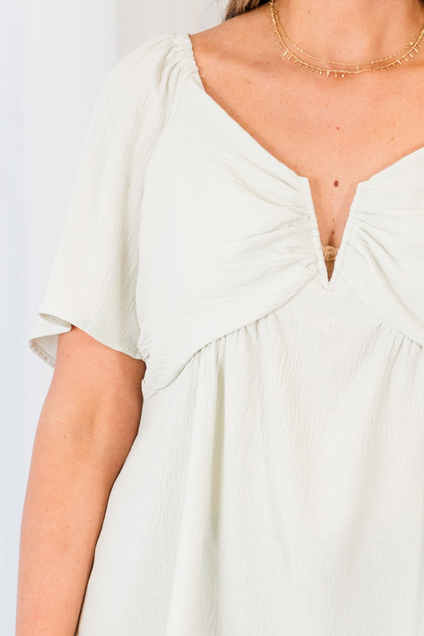 Chic Soul plus size clothing, short sleeve light sage top with small v-neck detail and puffed sleeves