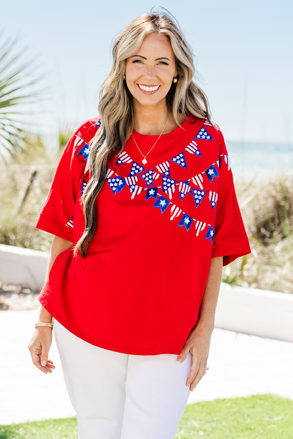 Chic Soul plus size clothing, short-sleeve drop-shoulder red top with a high-scoop-neckline with a red white and blue sequined hanging flag graphics across the bodice 